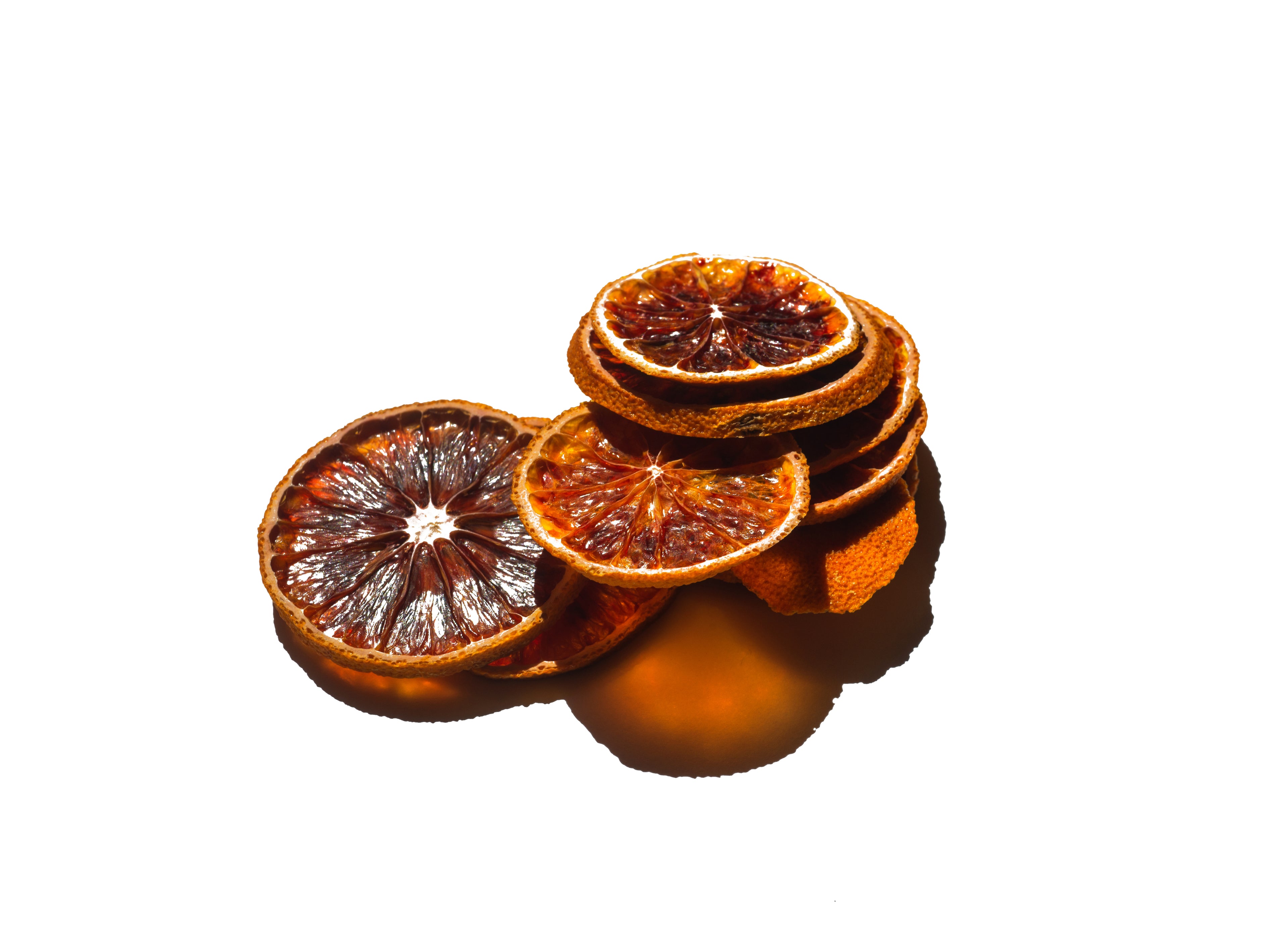 dried citrus slices on white background symbolizing the non-toxic, clean ingredients in halva beauty’s vegan brow oil