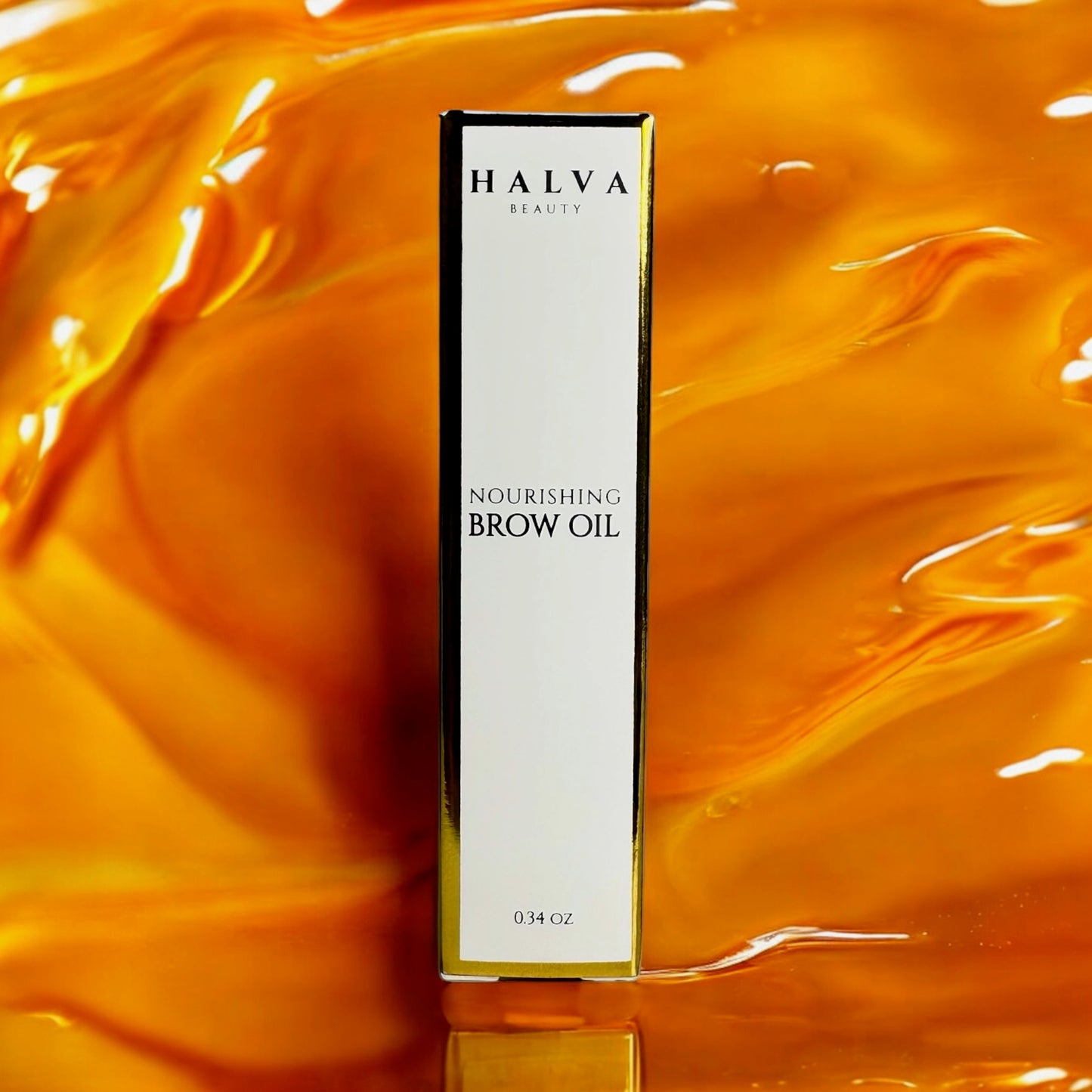 halva beauty nourishing brow oil and packaging on vibrant orange oil background
