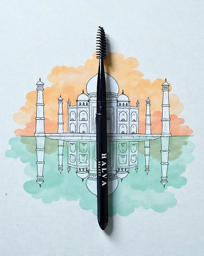 halva beauty spoolie shown over an illustration of the taj mahal in watercolors