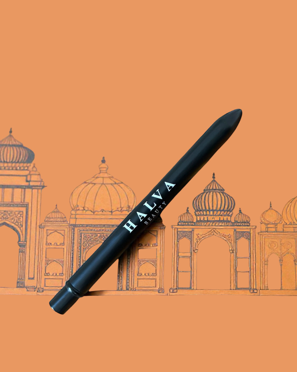 halva beauty reusable metal spoolie shown in its protective case against an illustrated indian architectural backdrop