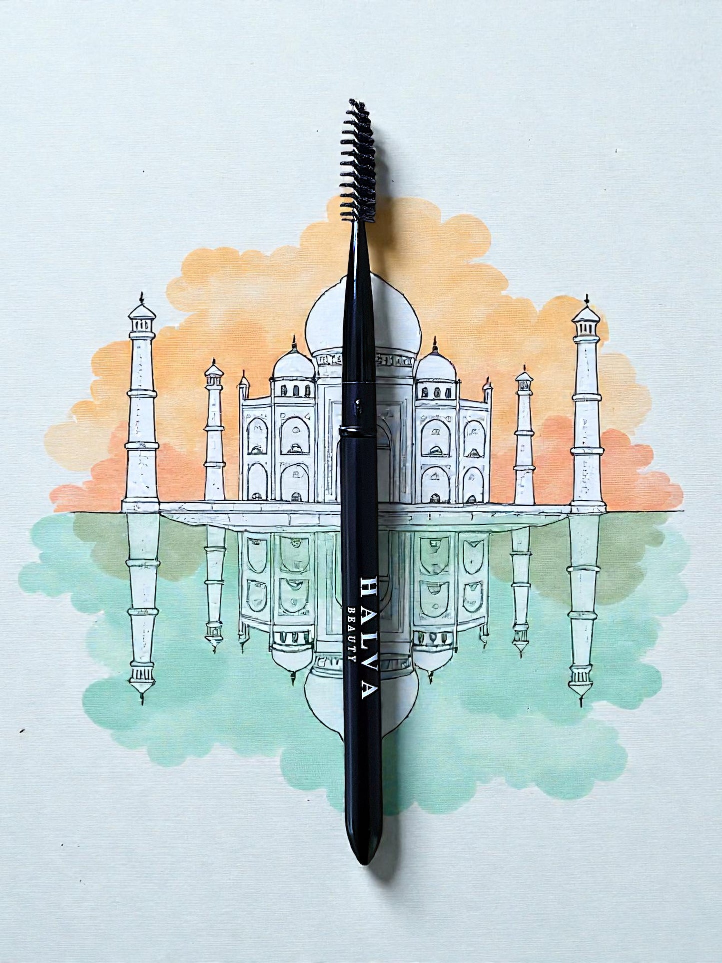halva beauty spoolie with an illustration of the taj mahal and indian flag in the background
