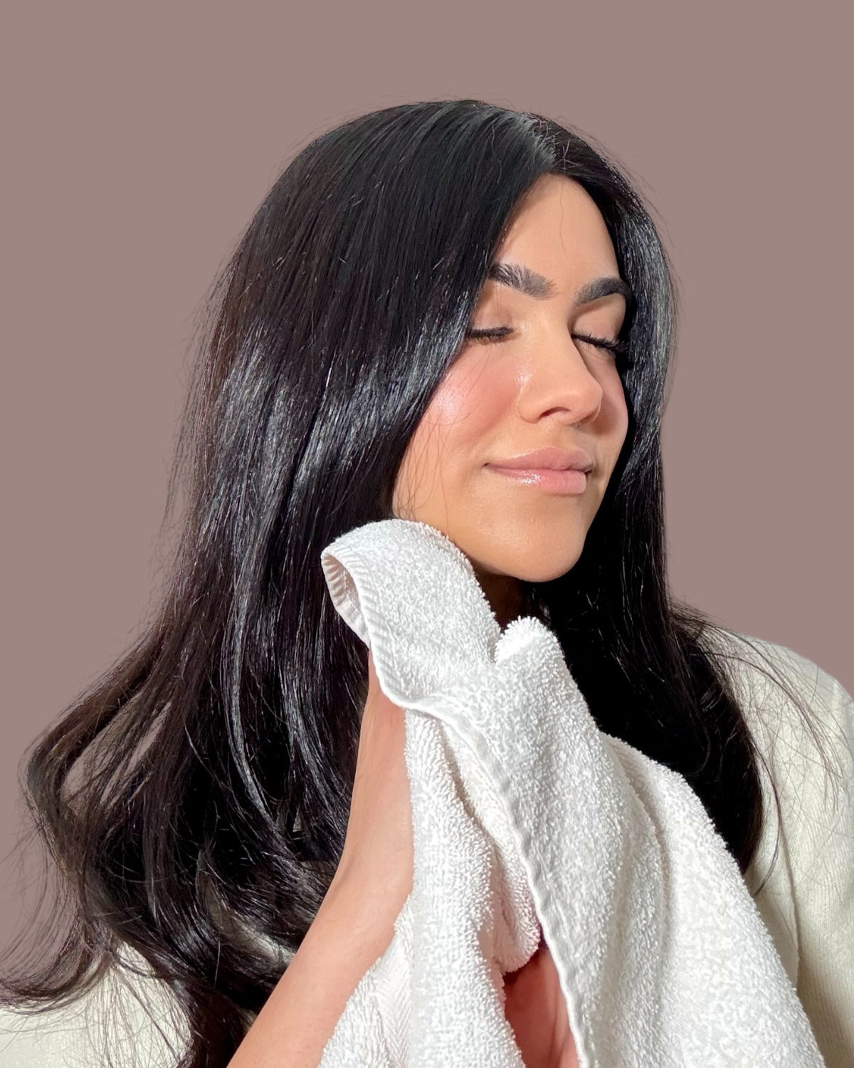 rinsing off halva beauty brow oil in morning routine before makeup